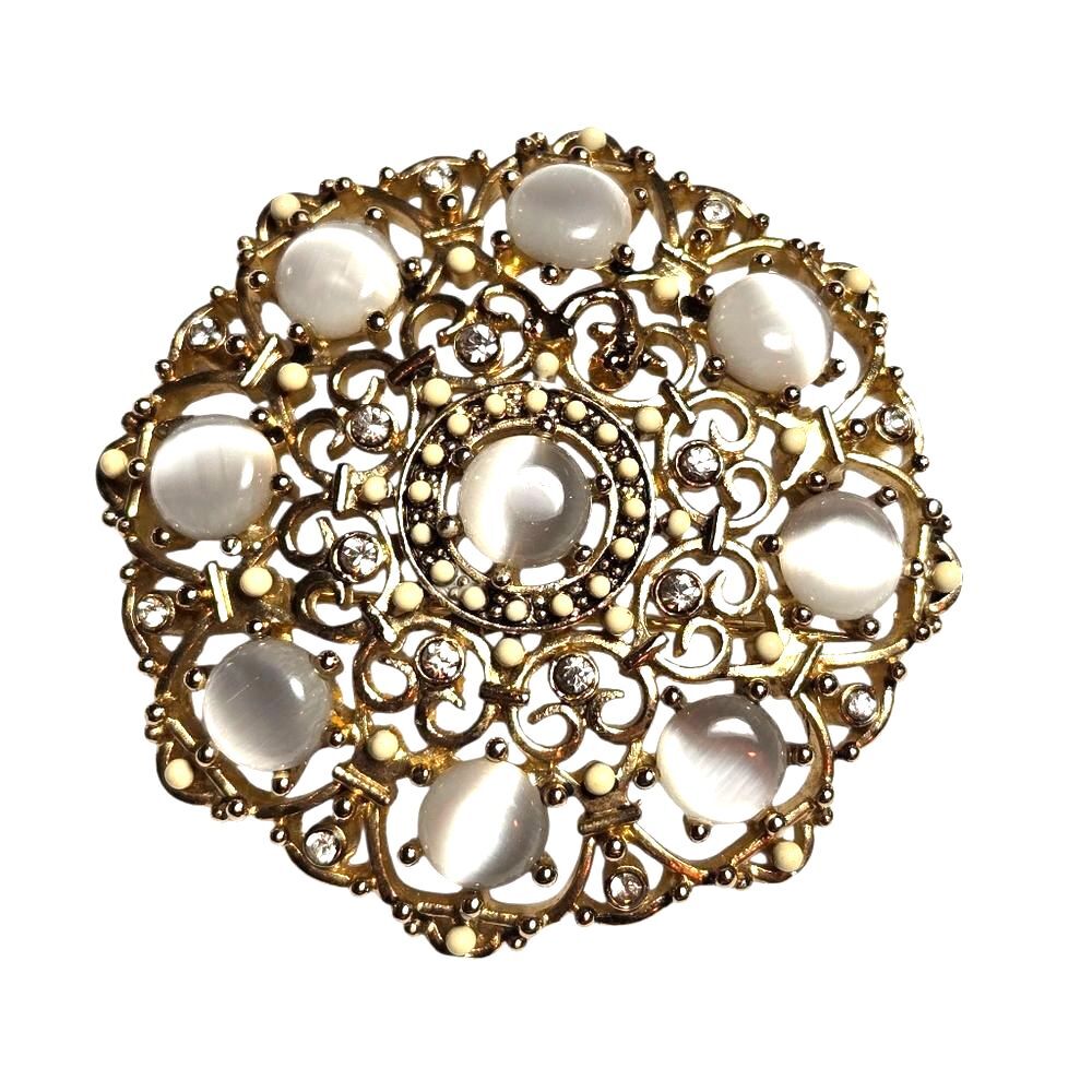 Monet White Cat Eye Cabochon & Rhinestone Round Gold Tone Brooch 1.75" Diameter